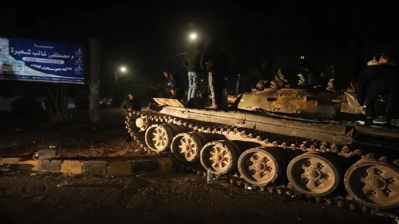 ** Rejim Karşıtı Güçler Humus'ta Stratejik İlçeyi Ele Geçirdi

**